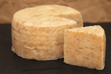 Produce of Spain - mixed milk specialty cheese with black garlic