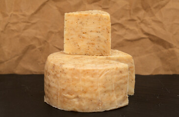 Produce of Spain - mixed milk specialty cheese with black garlic inclusions