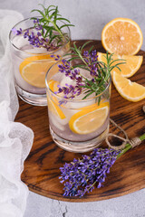 Obraz na płótnie Canvas Lavender summer cocktail lemonade or rosemary. Refreshing organic soft drink.