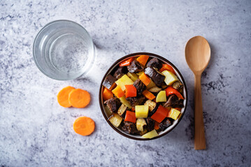 Beef potato carrot eggplant pepper stew in the bowl