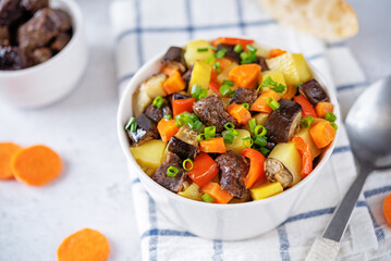Beef potato carrot eggplant pepper stew in the bowl