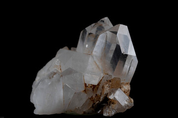 clear quartz crystals on black background