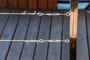 Wire tensioner, fastening clamps and cable clamps on railings