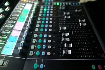 a sound mixer in operation at an event