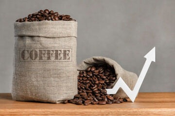 A bag of coffee beans and a chart arrow pointing up. The cost of coffee in the markets of the...