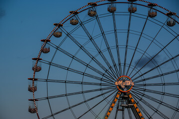 Fototapeta premium Fairground rides at night