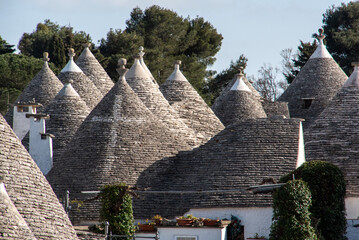 Iconic residential houses in historic Trulli district in Alberobello, Southern Italy