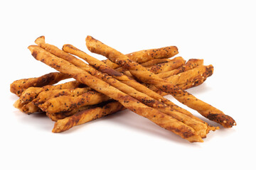 Handmade salted baked sticks with sesame and poppy seeds isolated on bright background. Close up view.