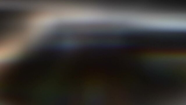 Abstract dark looping animation bokeh. Retro film noize.