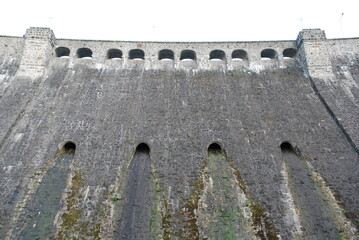 the crown of the dam in Lubachów, Poland. Stone structure, view upwards.