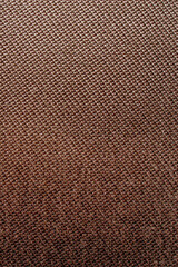 Brown background with dense textured fabric for sun blinds or mat, wallpaper, close up. Fabric background