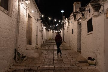 Scenic abandoned street in the Trulli district of Alberobello, Italy