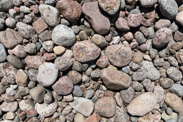 Sea rocks on the shore in bright sunlight. Natural background. for your design. Copy Space