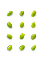 Closeup of fresh juicy organic green cherry tomatoes from the garden on isolated white background from above