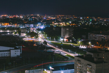 Fototapeta na wymiar night city on long exposure. Traces from car headlights
