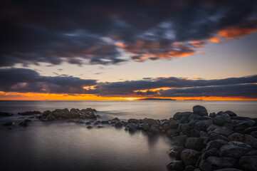Sunrise on Reis Magos beach. Canico, Madeira, Portugal. October 2021. Long exposure picture