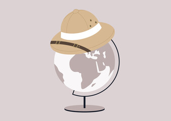 A colonial hunter cork hat, a symbol of colonialism and usurpation sitting on top of a round Globe on a metal stand - obrazy, fototapety, plakaty