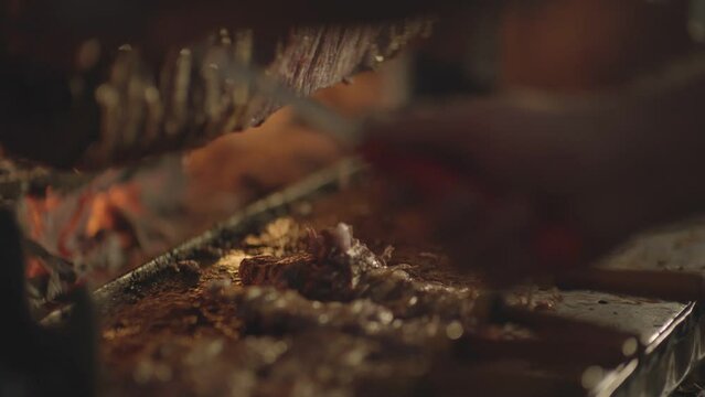 Details of the master and delicious kebab making Turkish kebab by the hearth
