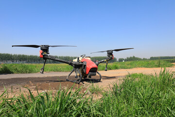Fototapeta na wymiar Plant protection UAV in the field, North China Plain