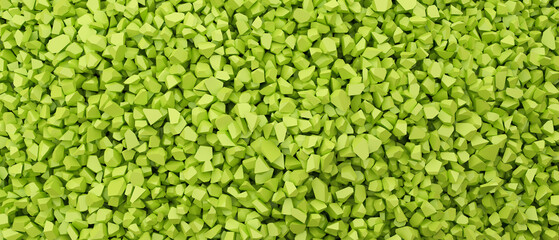 Green background pieces fragments of plastic