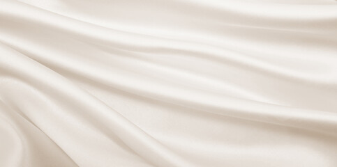 Fototapeta na wymiar Smooth elegant golden silk or satin luxury cloth texture as wedding background. Luxurious background design. In Sepia toned. Retro style