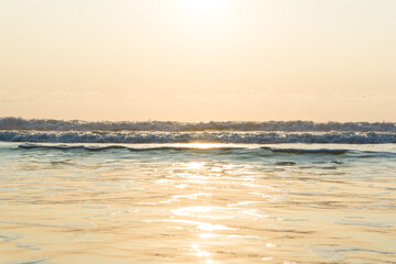 Obraz premium Sunset sunrise on sea wave beach nature background