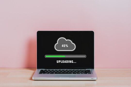 Upload data concept, Laptop computer on office desk waiting for cloud uploading on digital tablet, Data infomation, Technology network internet Concept.