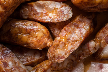 dry smoked cured sausage full frame of slices of fresh tasty pork sausages top view macro