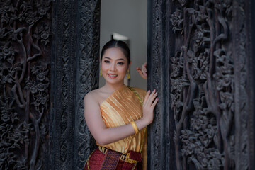 portrait of a person. Thai Woman in Traditional Costume of Thailand. Beautiful Thai girl in...
