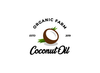 Coconut oil logo. Nature product coconut oil emblem. Ripe coco and half coconut and leaves with letters. Engraving style.