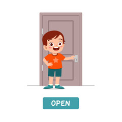 little kid standing and holding door knob