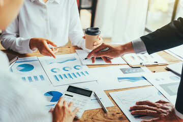 Cropped, close-up, Male boss explains the project assignment to his female assistant in the office.