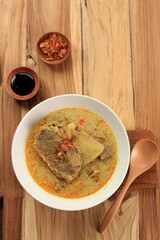 Gulai or Gule Daging Kambing, Indonesian Traditional Goat Curry Soup with Rich Spice for Ied Al Adha Menu.