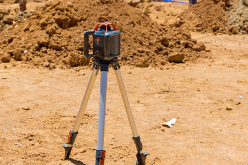 When road construction is underway, the contractor uses leveling rotary laser measuring equipment...