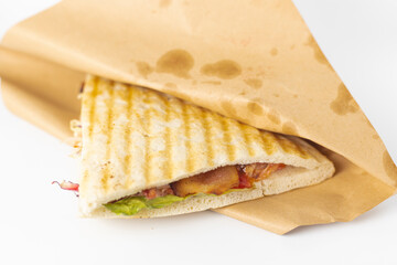 Delicious ham sandwich on white background. healthy ham and cheese with mayonnaise sandwich. Triangle sandwich with ham and cream cheese. Image about fast food.