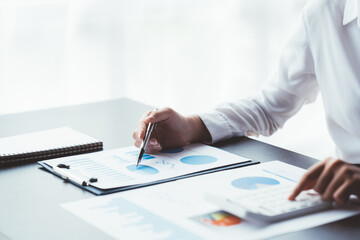 Data Analysis for Business and Finance Concept. Businessman Accounting Calculating Cost Economic Financial data.