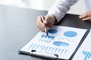 Data Analysis for Business and Finance Concept. Businessman Accounting Calculating Cost Economic Financial data.