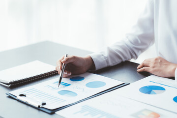 Data Analysis for Business and Finance Concept. Businessman Accounting Calculating Cost Economic Financial data.