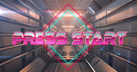 Fototapeta premium Image of press start text over moving digital tunnel