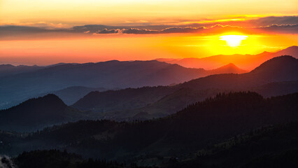 Fototapeta na wymiar Sunset from the Prislop Pass, Rodna (Rodnei) Mountains, Carpathians, Romania.