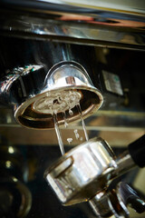 Cleaning the espresso machine, close-up of the espresso machine