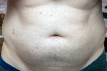 Fototapeta premium male belly with sides, sport