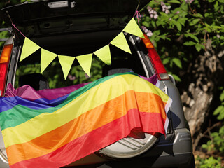 Rainbow flag on car. LGBT concept.