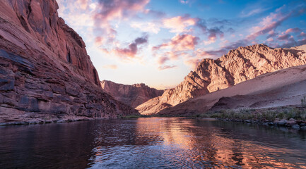 Colorado River in Glen Canyon, Arizona, United States of America. American Mountain Nature Landscape Background. Sunrise Sky Art Render.