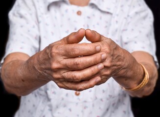 Hand of Asian elder woman. Concept of rheumatoid arthritis, osteoarthritis, or joint pain