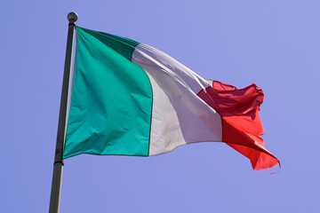 italian flag on mat in summer wind and blue sky