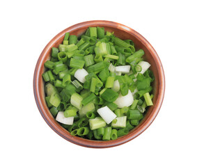 Sliced spring onions in a ceramic cup on a white background