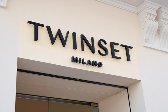 twinset sign text shop and logo brand on facade store from milano