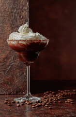 Coffee and chocolate cocktail with whipped cream.