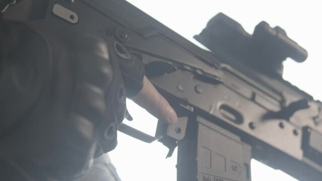 Reloading weapons. Close-up. Saiga TG2.